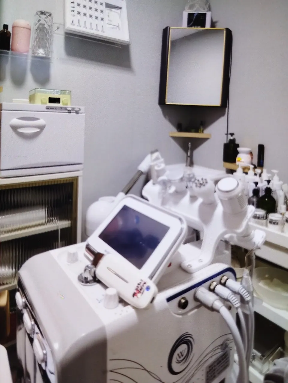 Treatment room with professional skincare equipment